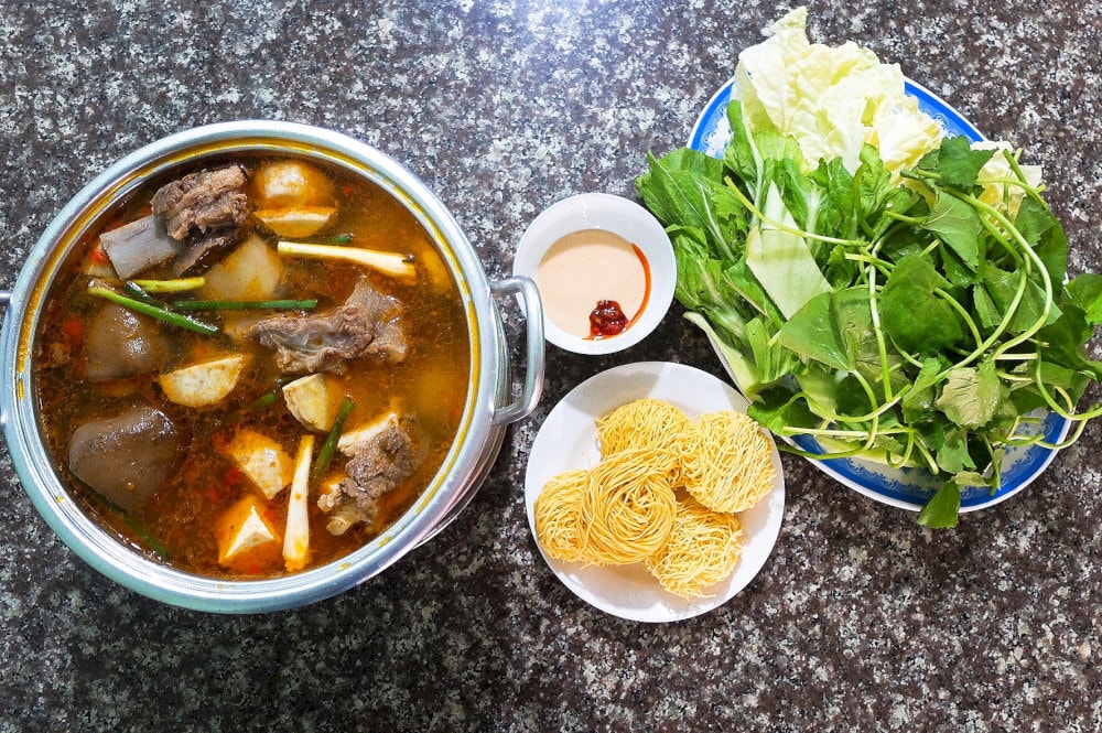 Rich broth, fresh veggies and thinly sliced beef is perfect for a group meal